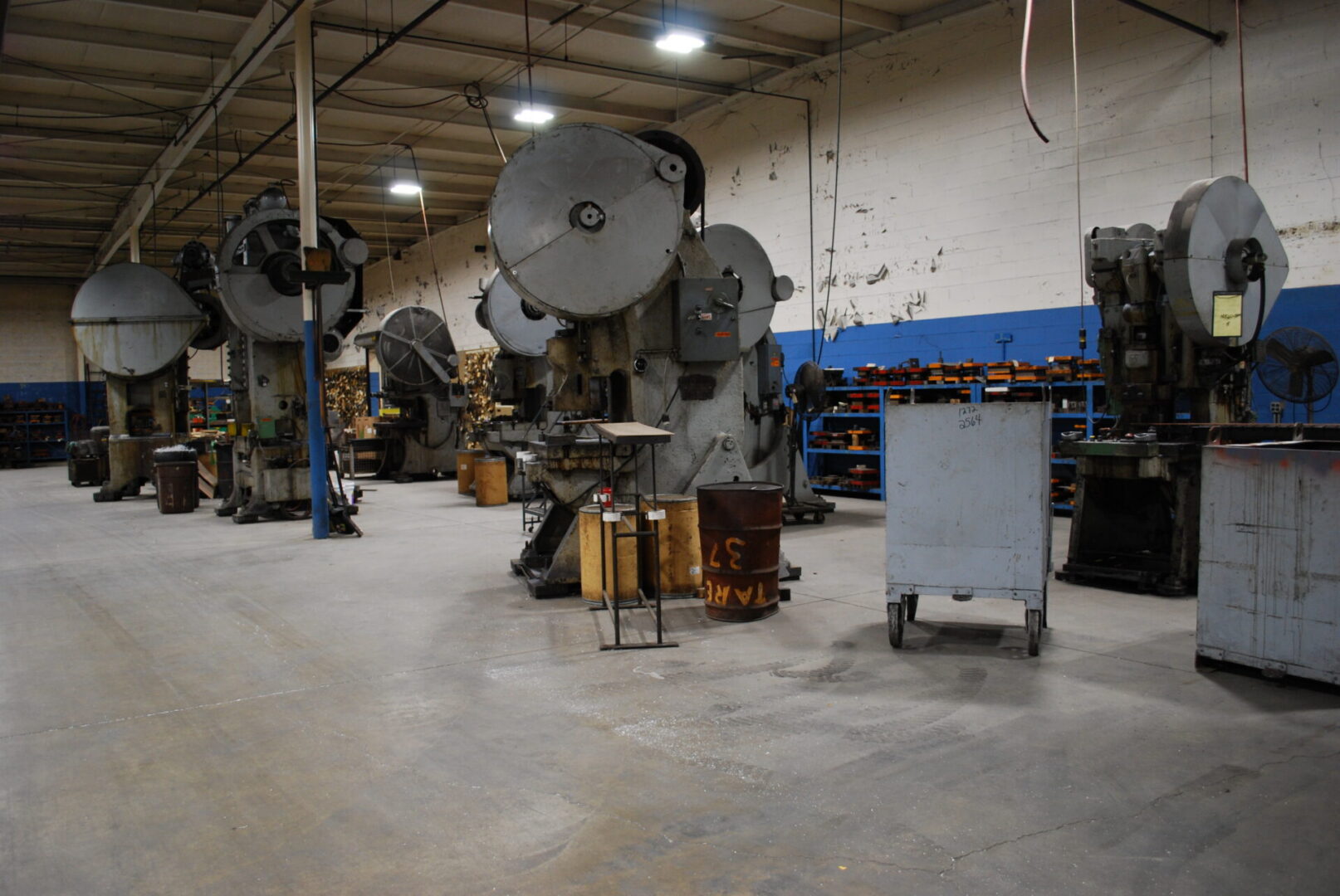 Industrial metal stamping presses in spacious factory