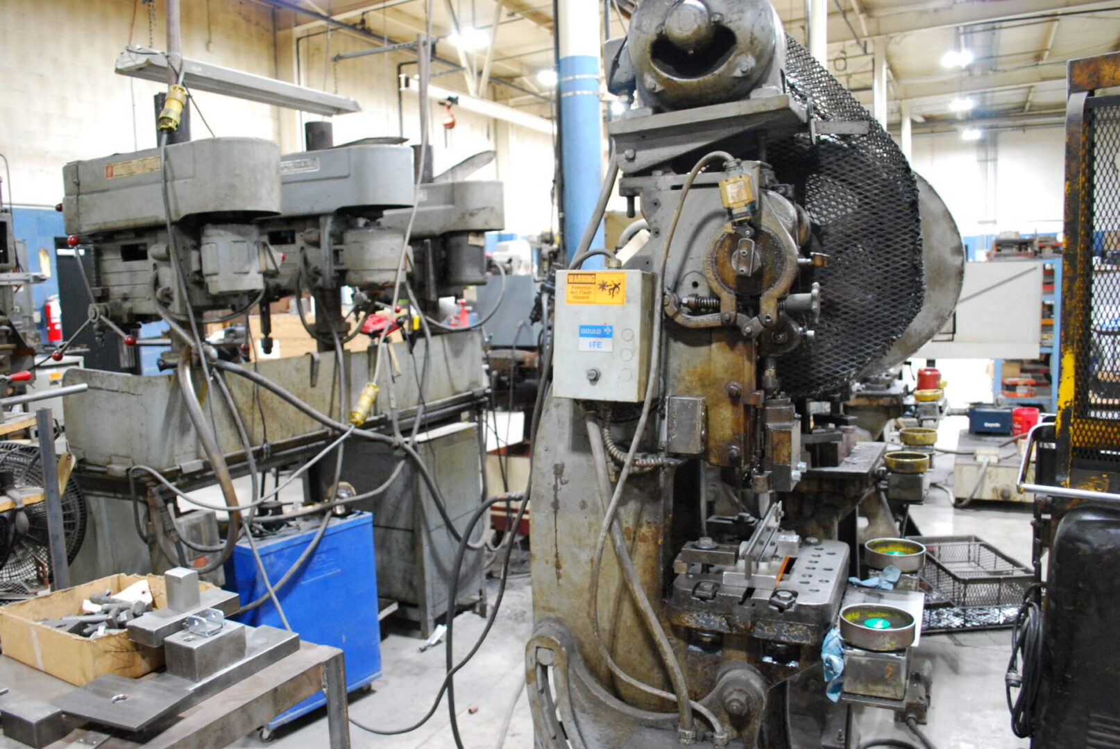 Industrial metal stamping press and drill machines