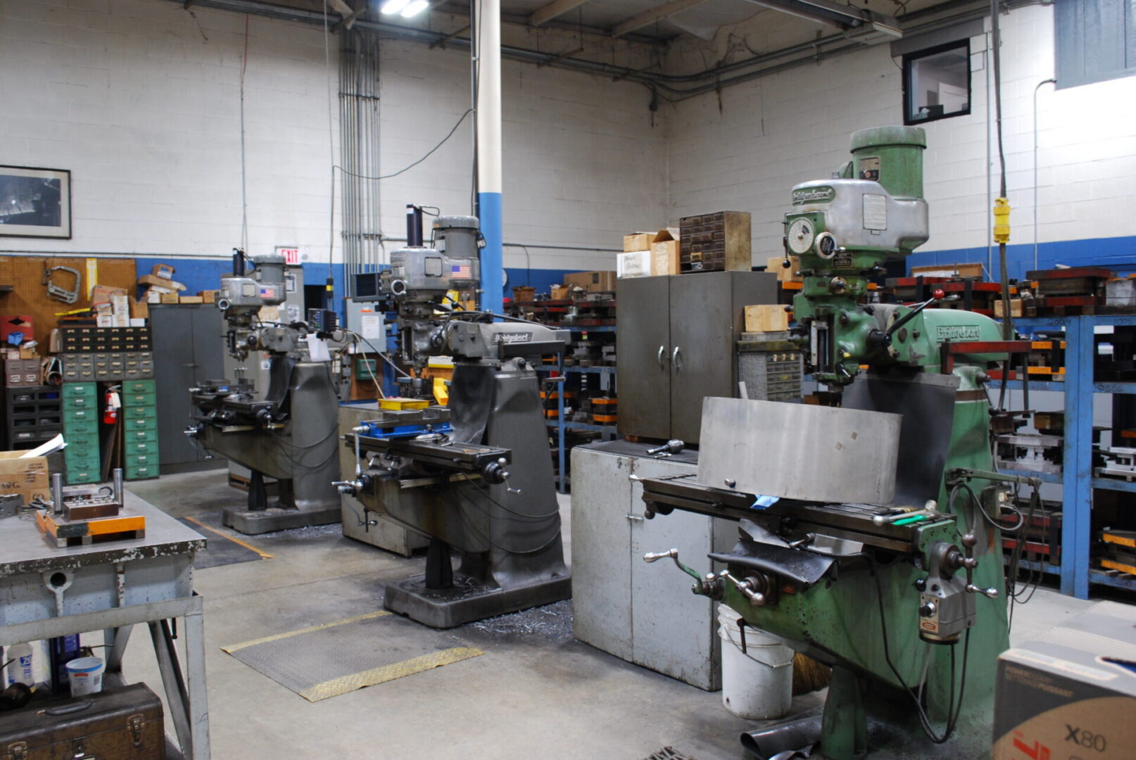 Machine shop interior with milling machines