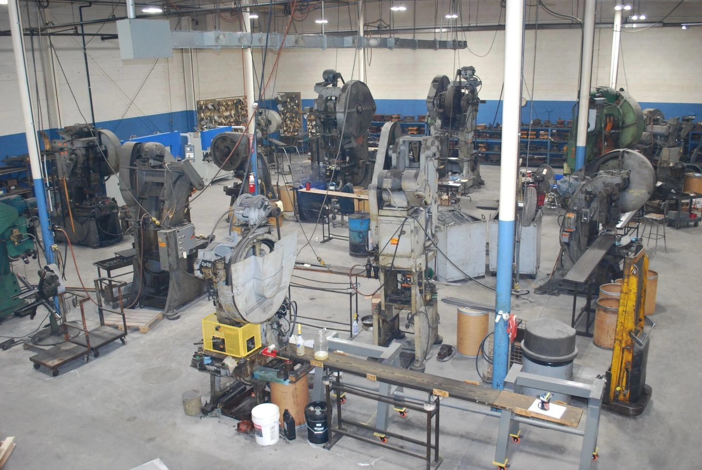 Industrial metal workshop filled with heavy presses